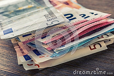 Several hundred euro banknotes stacked by value. Euro money concept. Euro banknotes. Euro money. Euro currency. Banknotes stacked Stock Photo