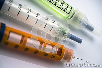 Several Injectors of insulin, conceptual image Stock Photo