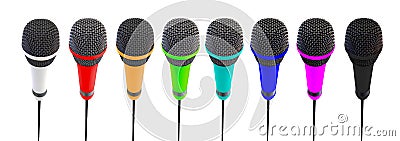 Several microphones aligned and colored. Stock Photo