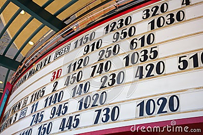 Movie showtimes at a theater Editorial Stock Photo