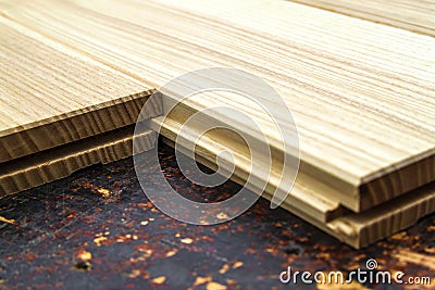 Several planks of beautiful laminate or parquet flooring with wooden texture as background Stock Photo