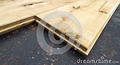 Several planks of beautiful laminate or parquet flooring with wooden texture as background Stock Photo