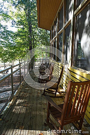 Several Porch Rocking Chairs in a Park Campsite Stock Photo