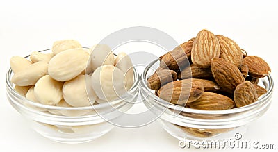 Several raw almonds white background surrounded Stock Photo