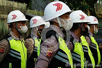 several security guards who are conducting a safety briefing Editorial Stock Photo