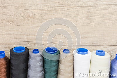 Several spools of thread of different colors and sizes Stock Photo