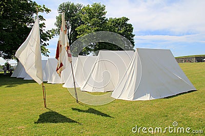 Several tents and flags set around the property during re-enactments of war, Fort Ontario, 2016 Editorial Stock Photo