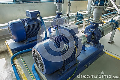 Several water pumps with large motors Stock Photo