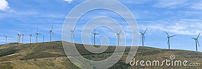 Several wind turbines and blue sky Stock Photo