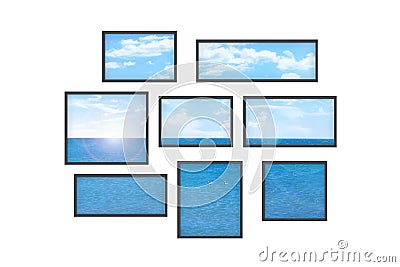 Several windows on a white wall with sea landscape Stock Photo