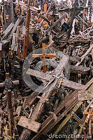 Several wooden crosses lying on the ground. Concept of faith, religion, death, sacrifice, and despair Editorial Stock Photo