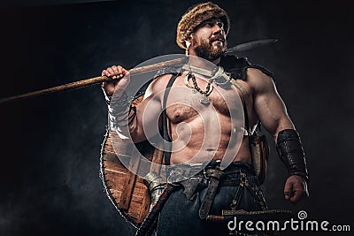 Severe barbarian in warrior clothes Stock Photo