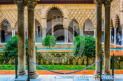 SEVILLA, SPAIN, JANUARY 7, 2016: view of the courtyard of the maidens situated inside of the royal alcazar palace in the Editorial Stock Photo