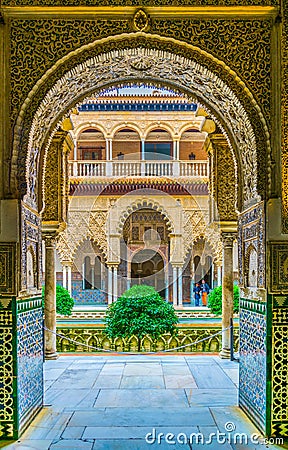 SEVILLA, SPAIN, JANUARY 7, 2016: view of the courtyard of the maidens situated inside of the royal alcazar palace in the Editorial Stock Photo