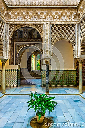 SEVILLA, SPAIN, JANUARY 7, 2016: view of the courtyard of the maidens situated inside of the royal alcazar palace in the Editorial Stock Photo