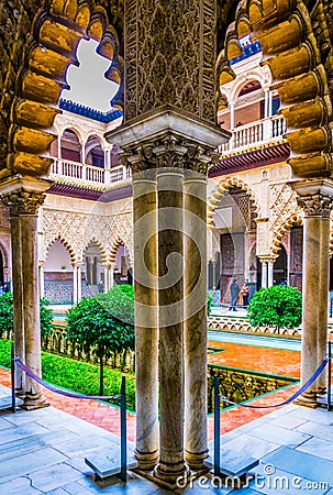 SEVILLA, SPAIN, JANUARY 7, 2016: view of the courtyard of the maidens situated inside of the royal alcazar palace in the Editorial Stock Photo