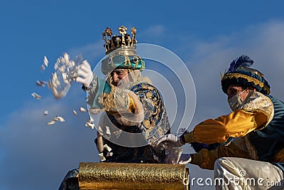 Three wise men parade in Seville, Spain. The parade is a start to the magical night for kids when the kings come to bring presents Editorial Stock Photo