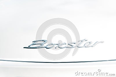 Seville, Spain - April 12, 2023: Porsche Boxter silver color inscription on the white old vintage car door background in Seville, Editorial Stock Photo