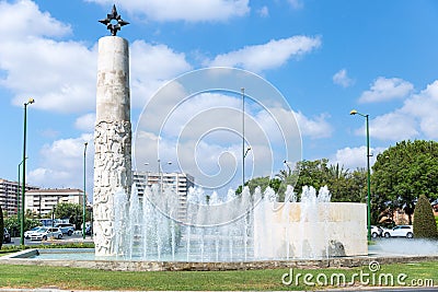 View of beautiful fountain with Juan Sebastian de Elcano Monument. Editorial Stock Photo