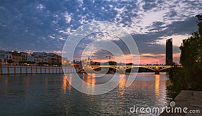 Sevilla in Spain, Night view of the fashionable and historic districts of Triana Stock Photo