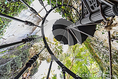 Seville, Spain - October 28, 2017: low-angle shot of spiral staircases in gardens of Palace of the Dukes of Alba or Palacio de las Editorial Stock Photo