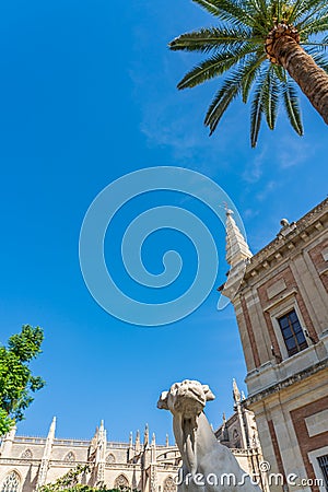 Monument of dog that looking thoughtfully into the distance at the Catedral of Seville Editorial Stock Photo
