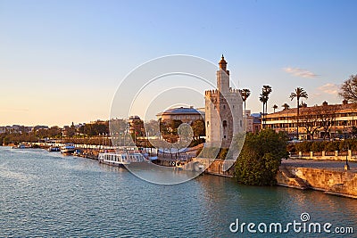 Seville sunset skyline torre del Oro in Sevilla Stock Photo