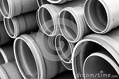 Sewage pipes close up shot in black and white Stock Photo