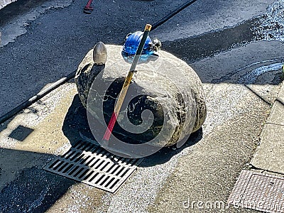 Sewer cleaning and worker with water and hose Editorial Stock Photo