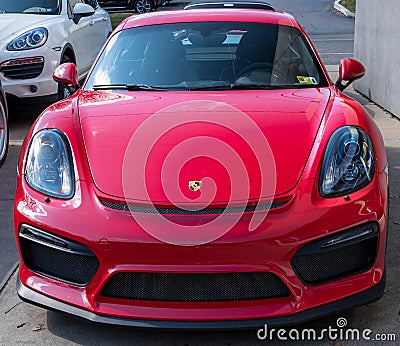 Sewickley, Pennsylvania, USA March 5, 2023 A used, red Porsche coupe for sale at a dealership Editorial Stock Photo