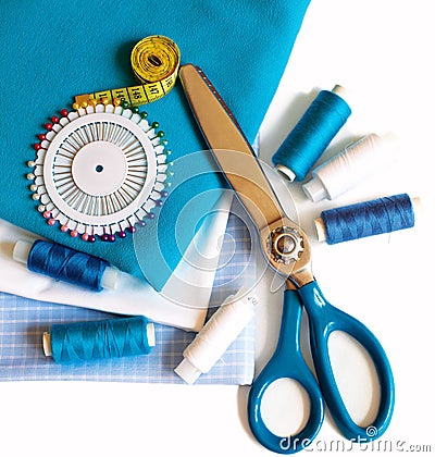 Sewing background with color threads, meter, pins and scissors Stock Photo