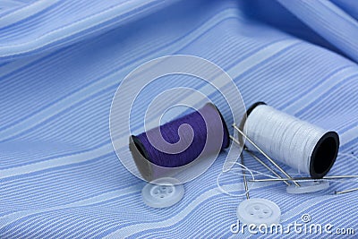 Sewing cotton needle and pins Stock Photo