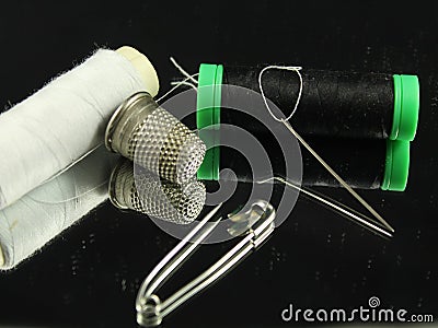 Sewing Needle thread scissors thimble tailor buttons Stock Photo