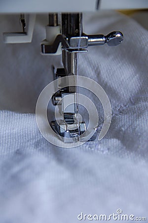 Sewing machine operation process Stock Photo