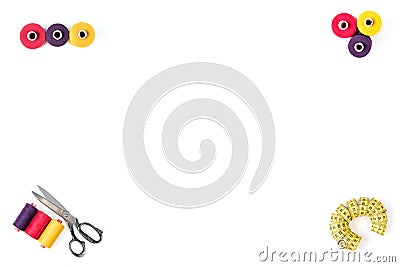 Sewing supplies thrread, buttons, tape, scissors on white background. Text, cover, print, poster ready Stock Photo