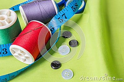 Sewing threads, meter and scissors Stock Photo