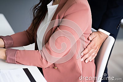 Sexual Harassment At Workplace. Touching Woman Stock Photo