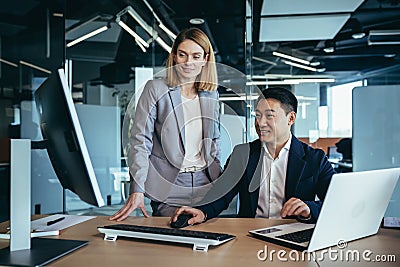 Sexual relationship and flirt at office. Young sensual Business lady seducing her busy male colleague. sexy secretary flirting Stock Photo