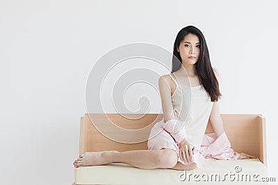 Sexy woman in pajamas posing in seductive mood Stock Photo