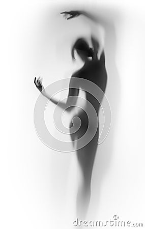 and beautiful dancer woman body, hands silhouette from behind. Stock Photo