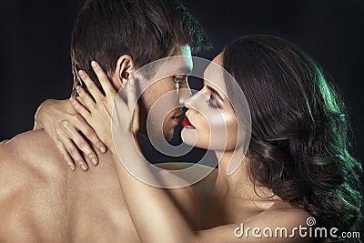 beauty couple. Kissing couple portrait. Sensual brunette woman in underwear with young lover, passionate couple Stock Photo