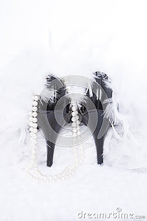 Black Pumps with Pearls and Boa Stock Photo