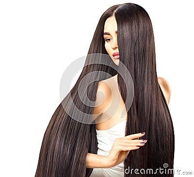 brunette model girl touching her long shiny hair Stock Photo