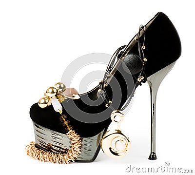 fashionable shoe with golden jewelry Stock Photo
