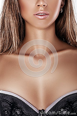 female breast in lace bra Stock Photo