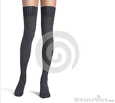 Female legs in stockings isolated over white background Stock Photo