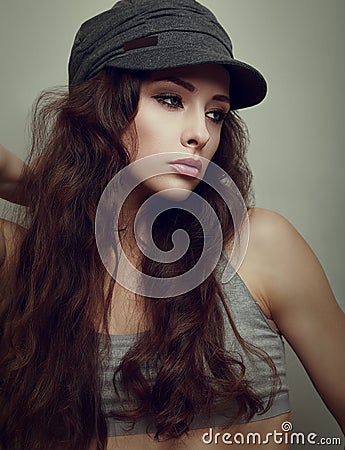 female model posing in modern cap Stock Photo