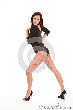 girl long legs wearing heels and leotard Stock Photo