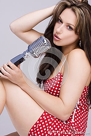 https://thumbs.dreamstime.com/x/sexy-girl-singing-retro-mic-12430589.jpg