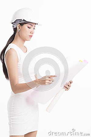 girl structural engineer looking at drafting paper Stock Photo